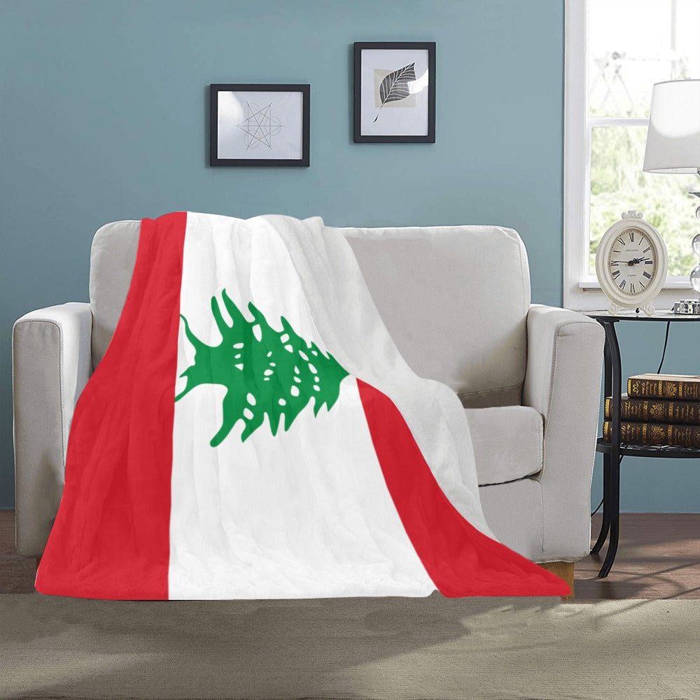 "Luv My Flag blanket featuring Lebanon's flag on couch."