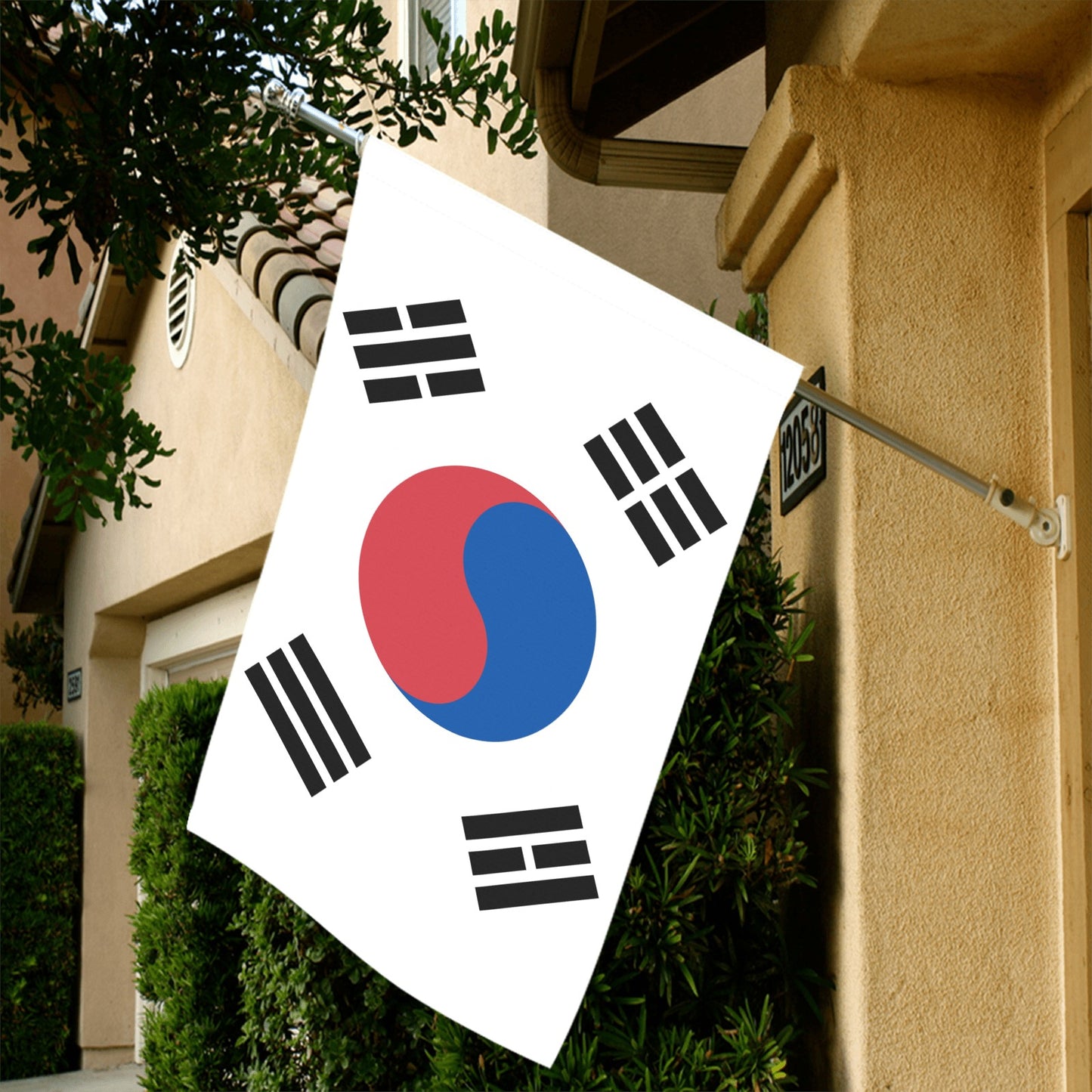 Luv My Flag South Korean flag on house facade.