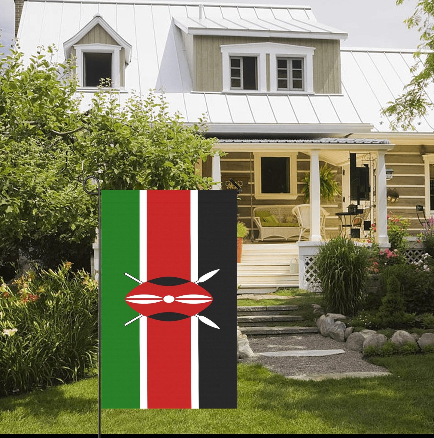 Front yard home with Luv My Flag Kenyan flag.