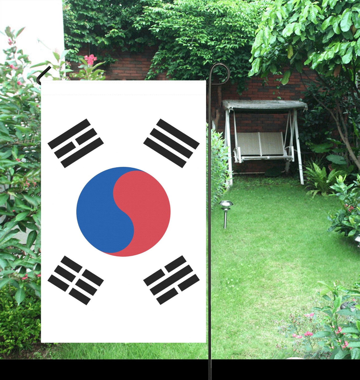 Luv My Flag showing South Korean flag in garden.