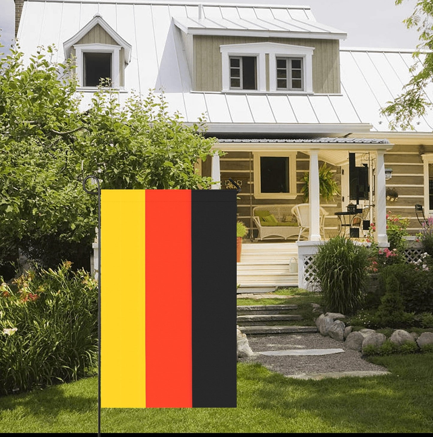 "Luv My Flag: Garden flag in front of charming house."