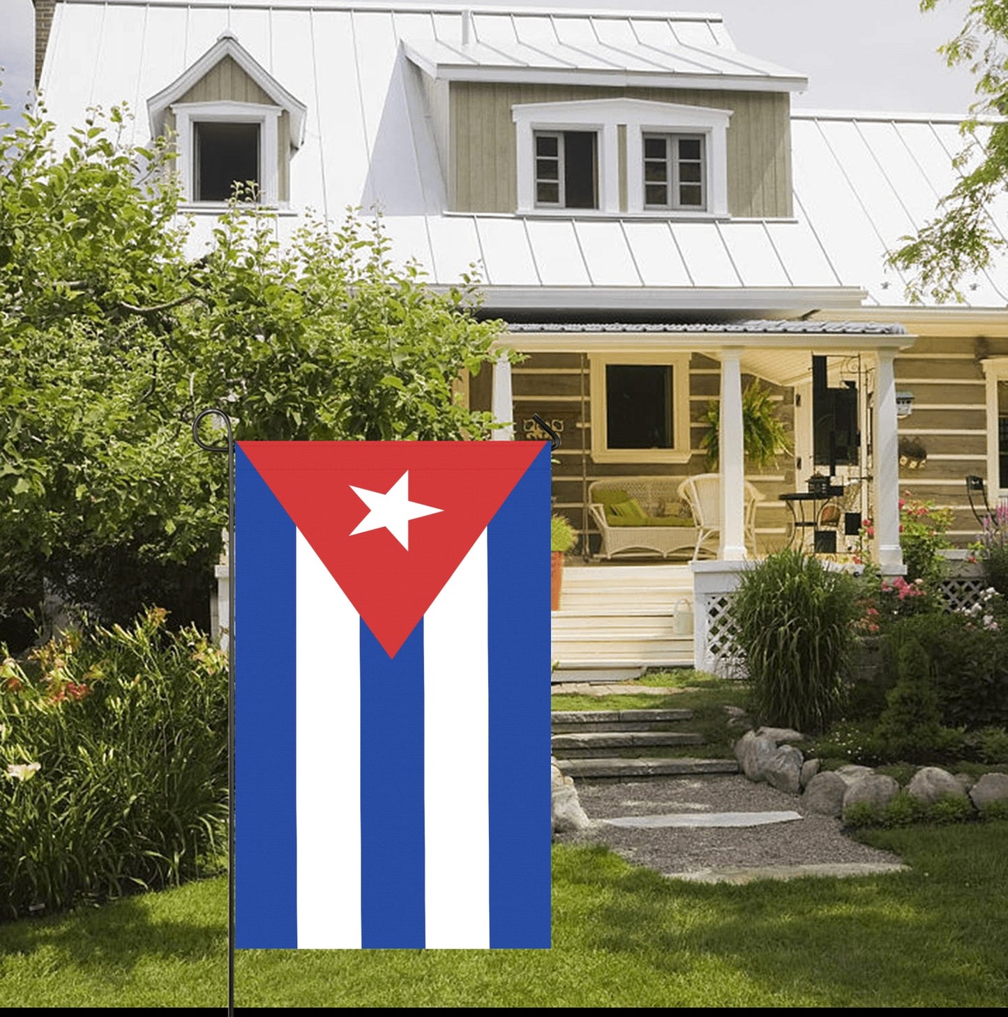 Luv My Flag Cuban flag displayed outside charming white porch.