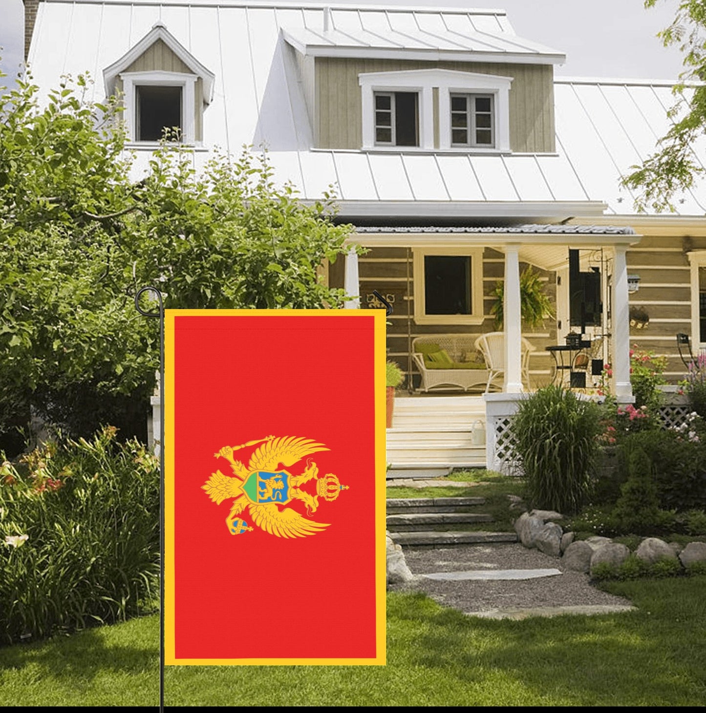 Red garden flag by Luv My Flag near porch.