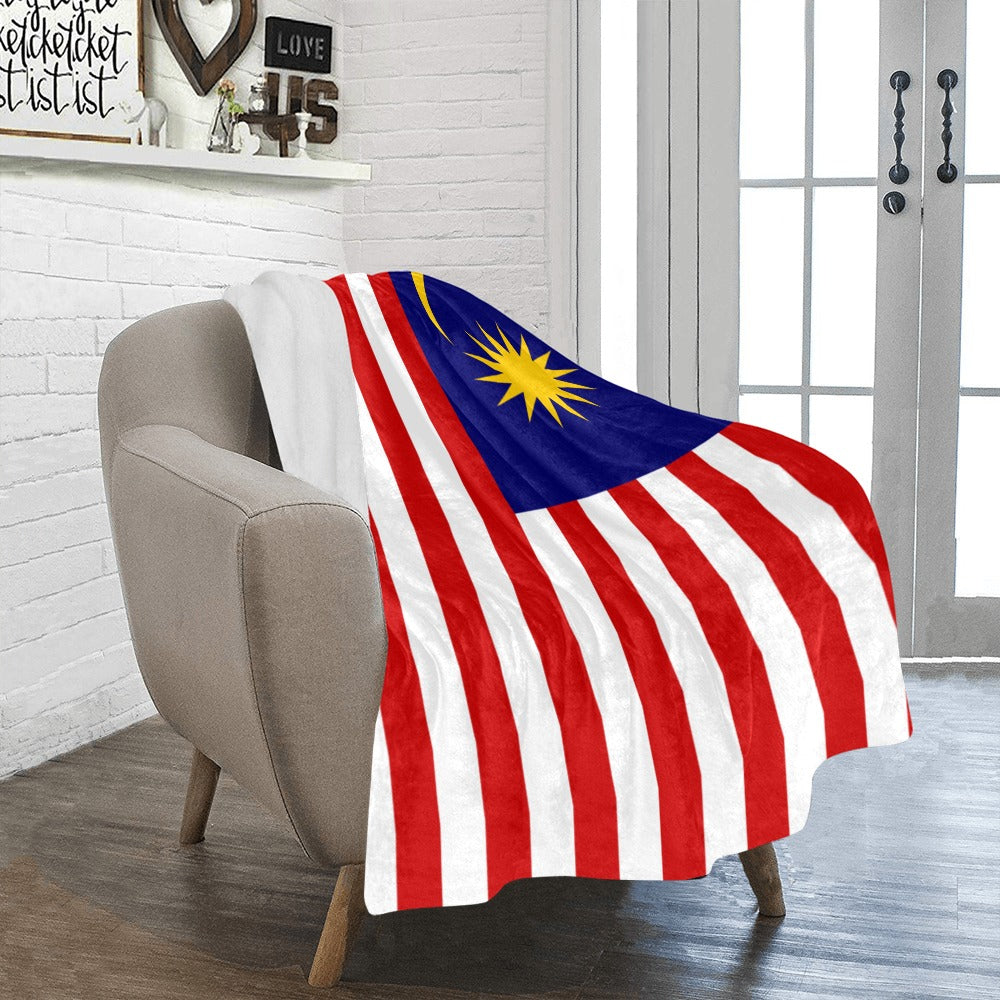 Cozy Luv My Flag blanket draped on modern armchair.