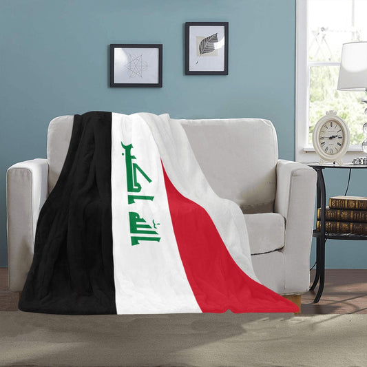 Cozy Luv My Flag blanket with patriotic design on sofa.