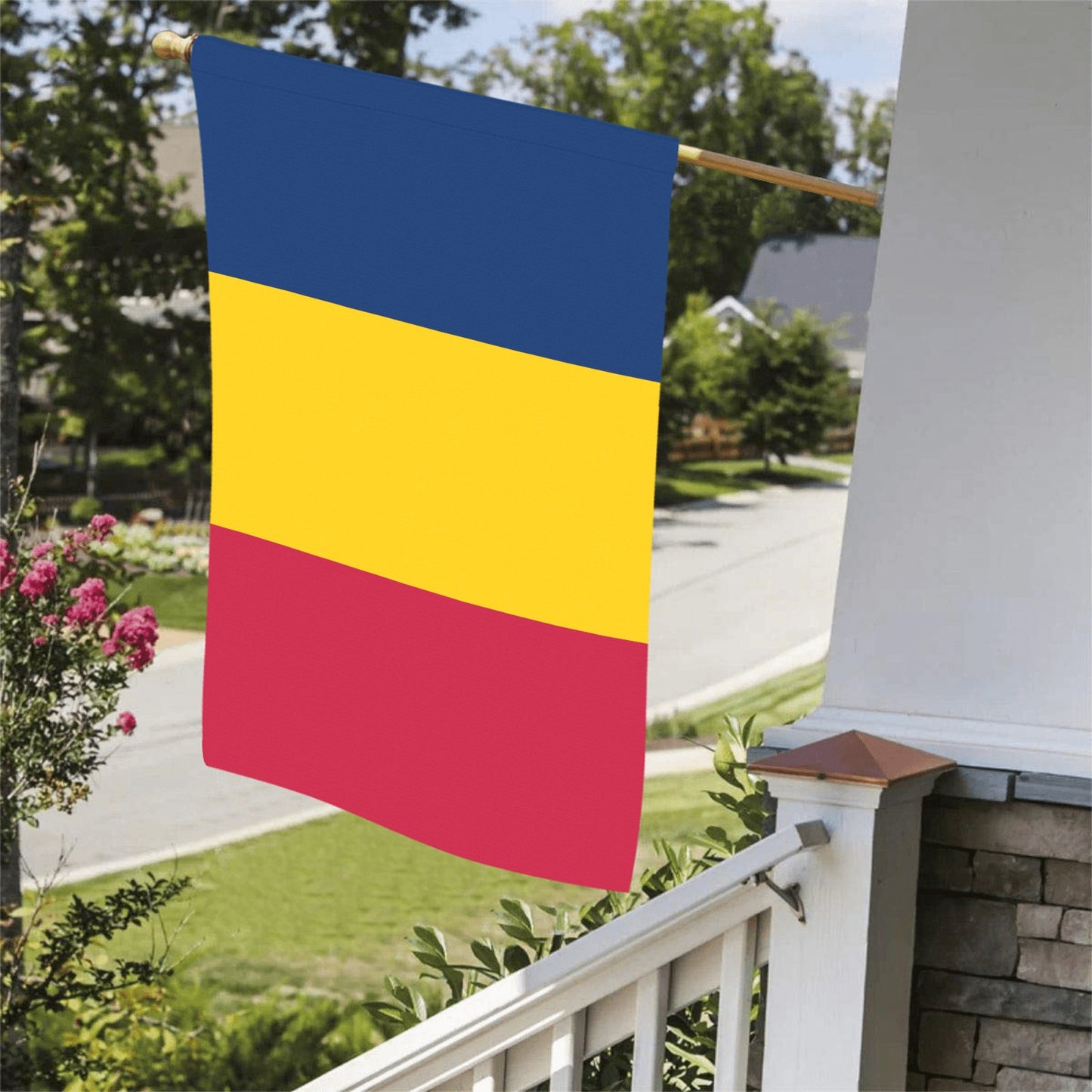 Luv My Flag tricolor blue, yellow, red flag displayed outside.