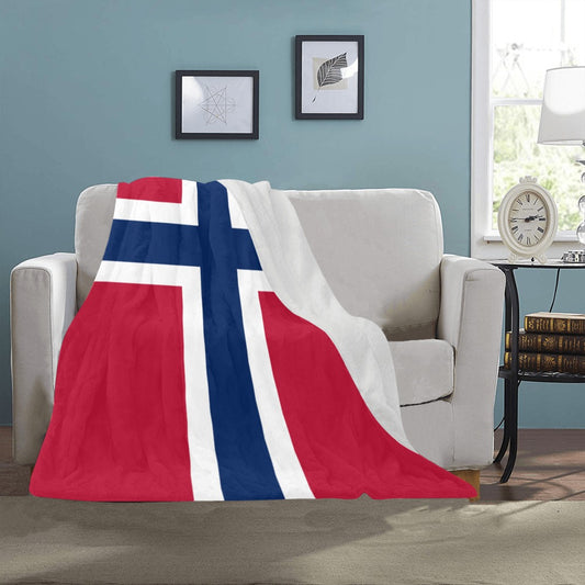 Norway Flag fleece-topped blanket on couch.