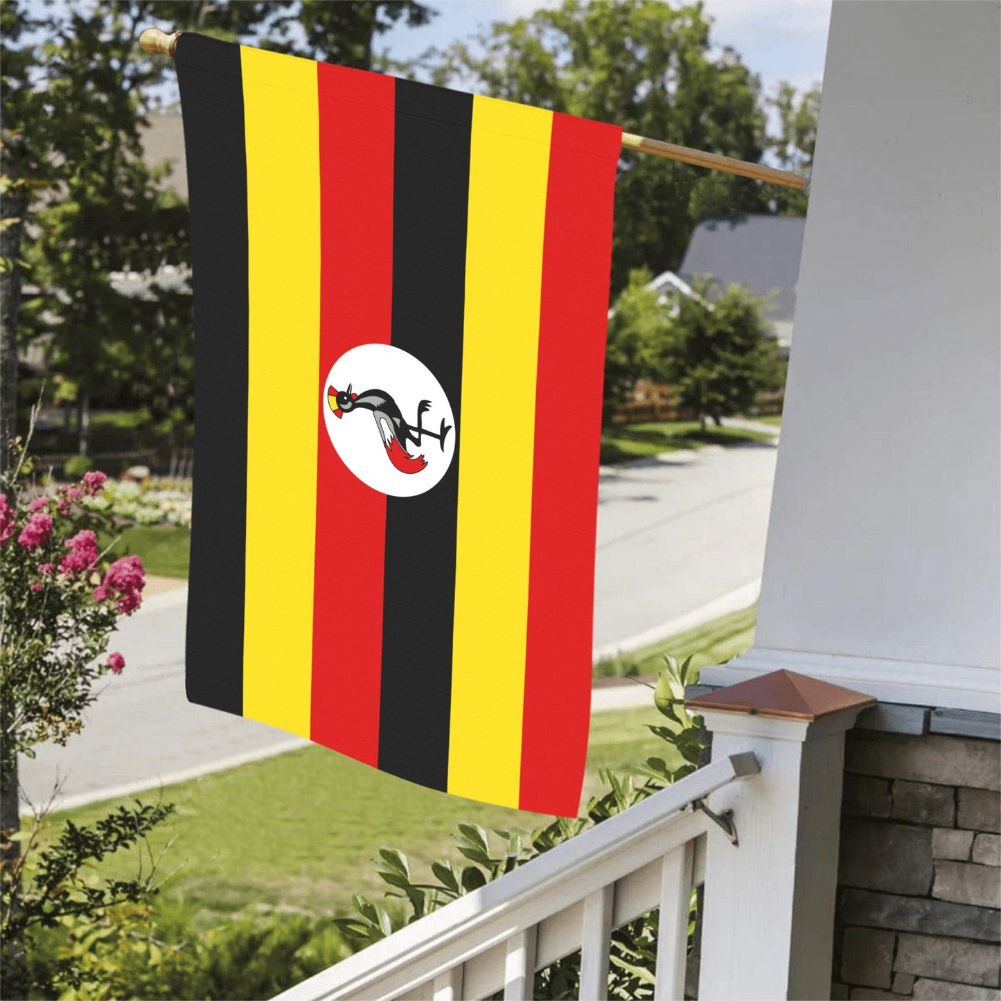 Ugandan flag hanging outside, porch view, by Luv My Flag.