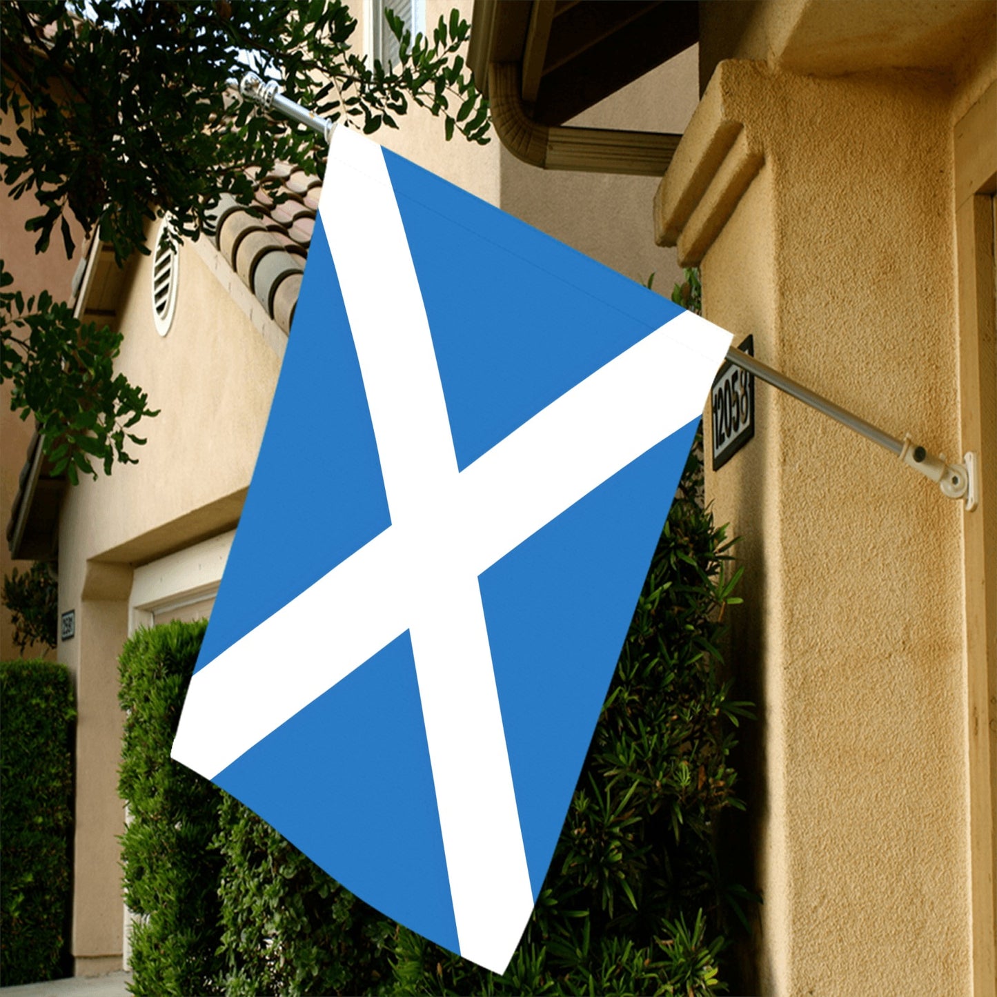 Scottish flag displayed outside a house. Brand: Luv My Flag.