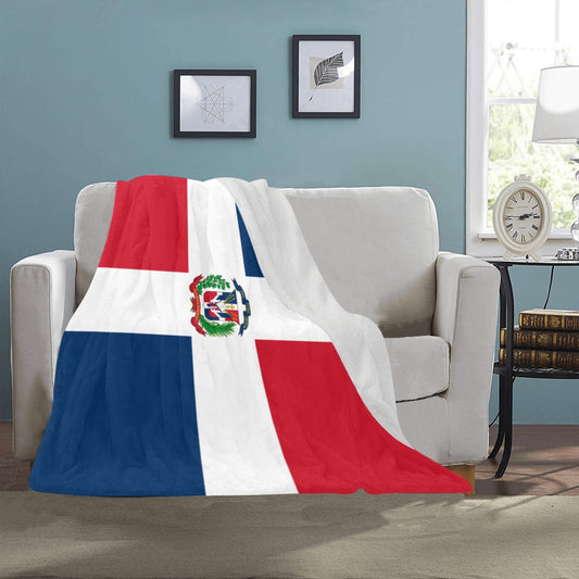 Luv My Flag blanket with Dominican Republic design on sofa.