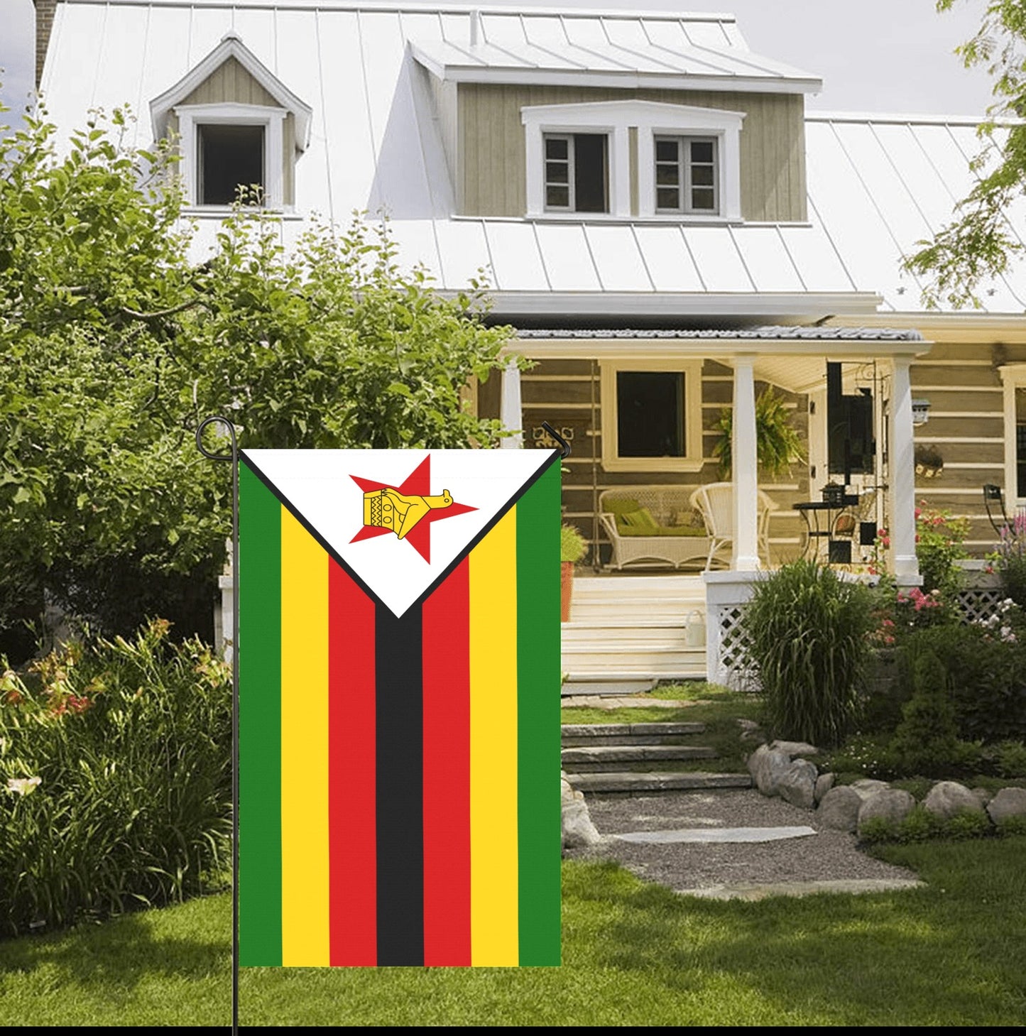 House with Zimbabwean flag by Luv My Flag, garden setting.