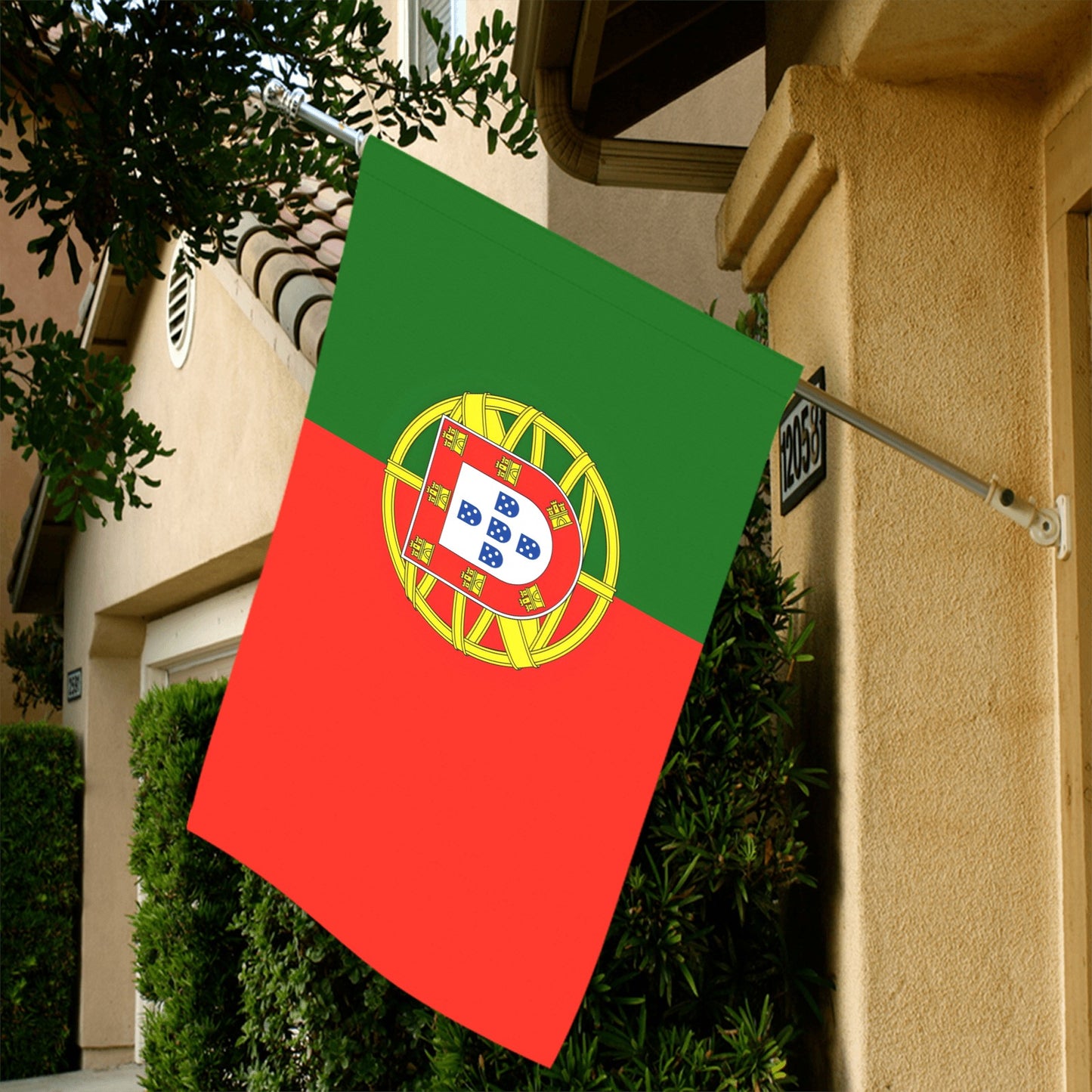 Luv My Flag Portugal flag displayed outside residential building.