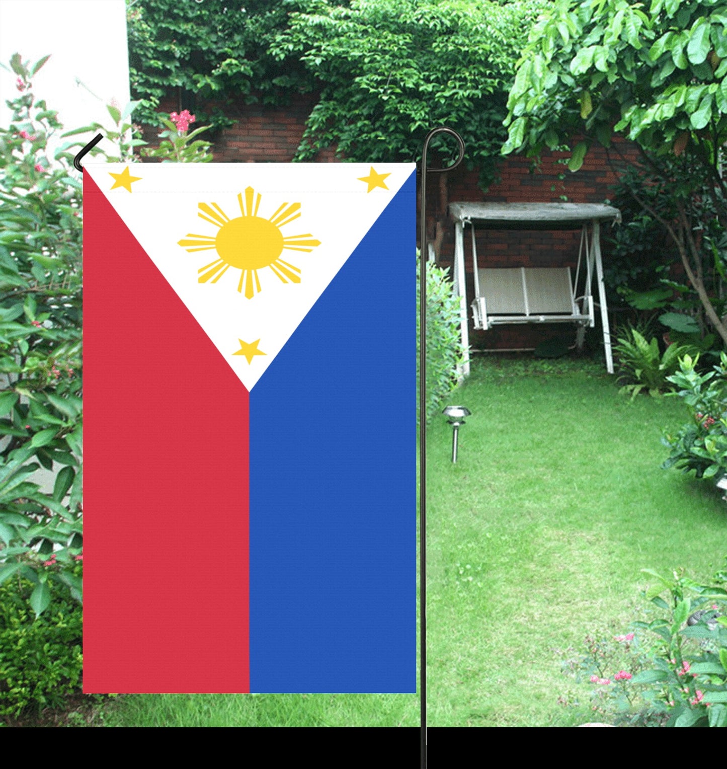Luv My Flag garden flag with Philippine design in backyard.