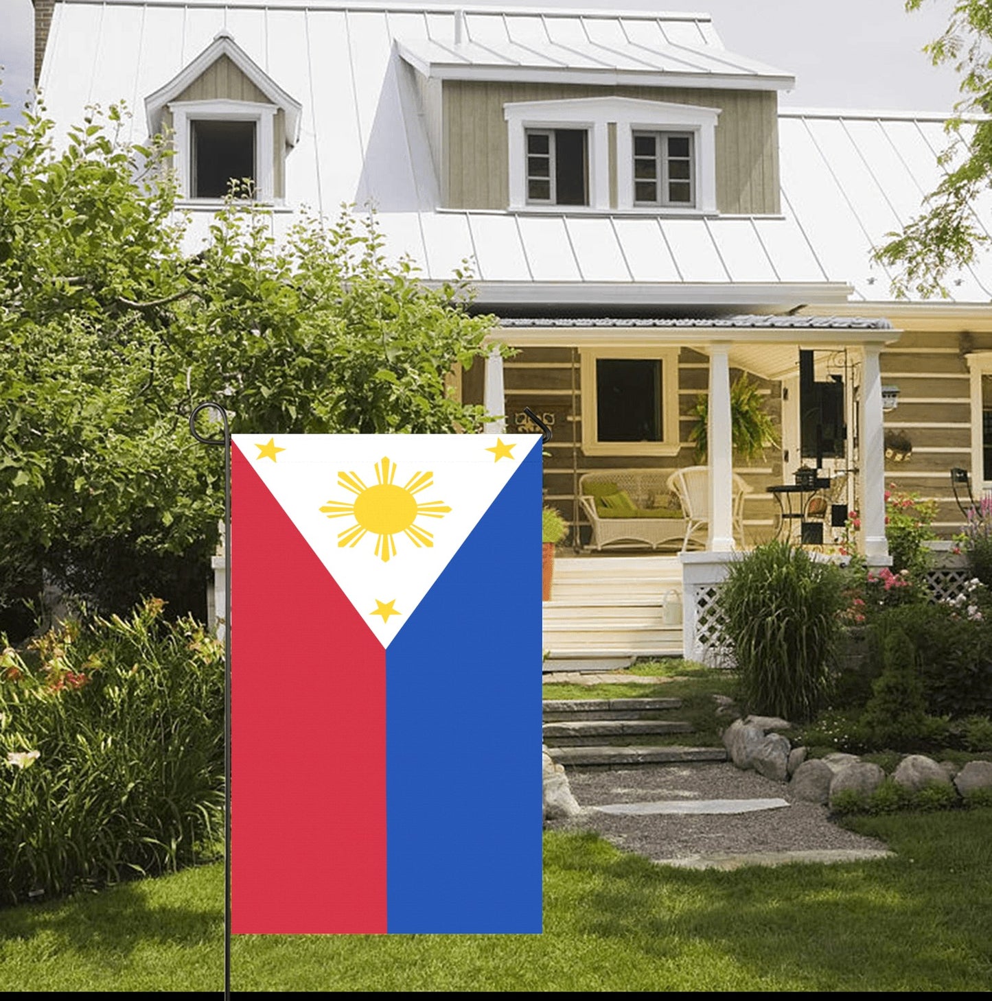 House with garden decor featuring Luv My Flag banner.