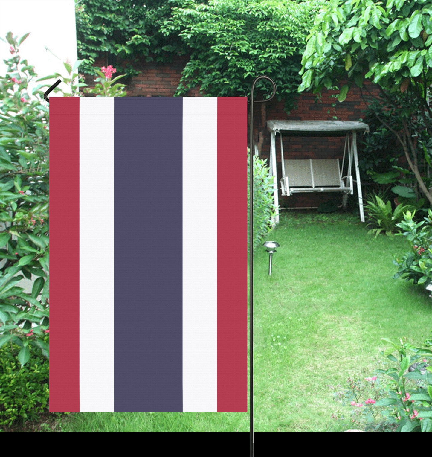 Luv My Flag red, white, blue striped flag outdoors.