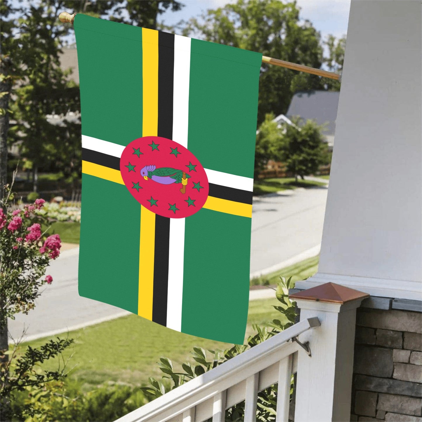 Luv My Flag Dominica flag displayed on a porch.