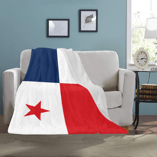 Cozy Luv My Flag blanket draped on white sofa.