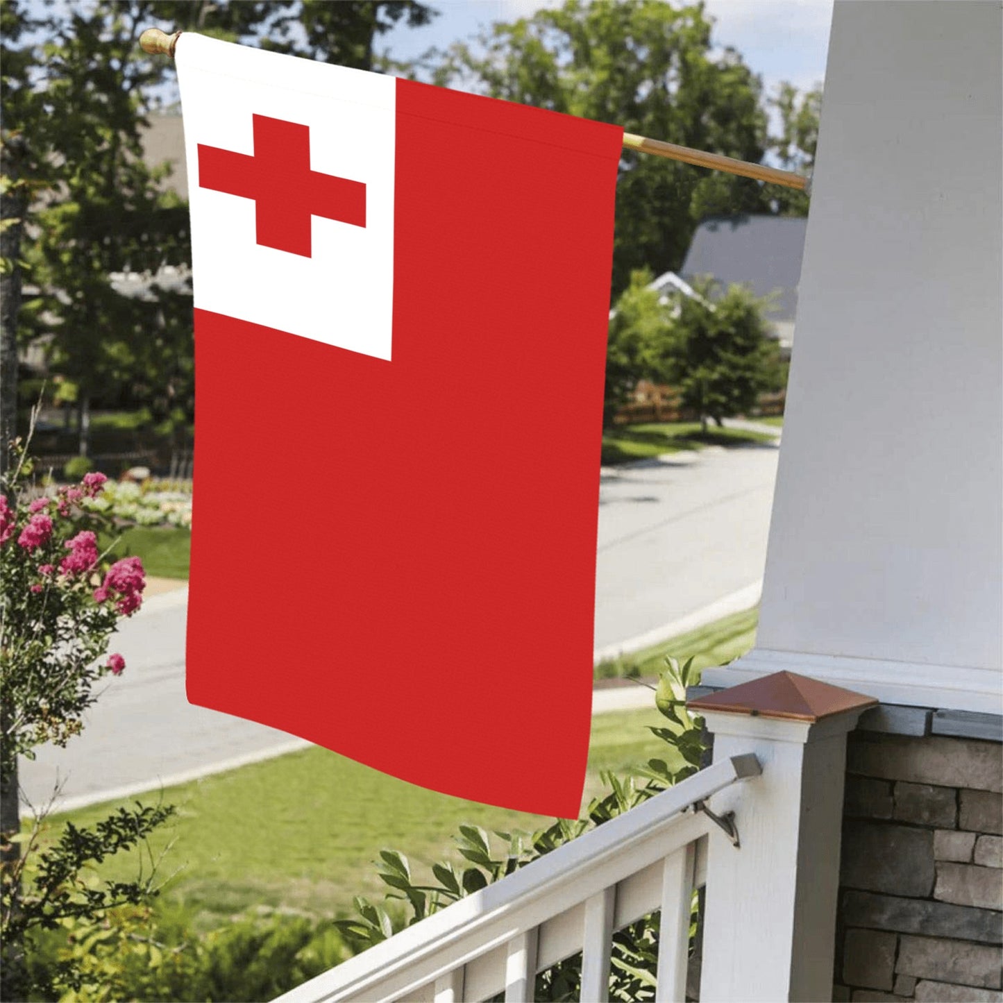 Red cross flag by Luv My Flag on porch.