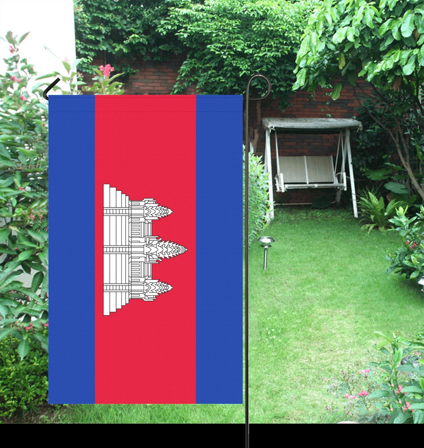 Luv My Flag Cambodia flag displayed in lush garden.