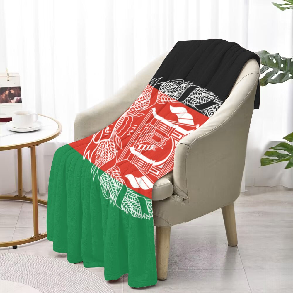 Luv My Flag blanket draped over chair, colorful design.