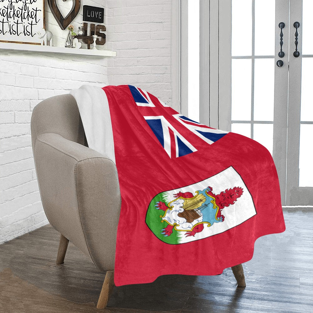 Cozy chair with Luv My Flag fleece blanket draped.