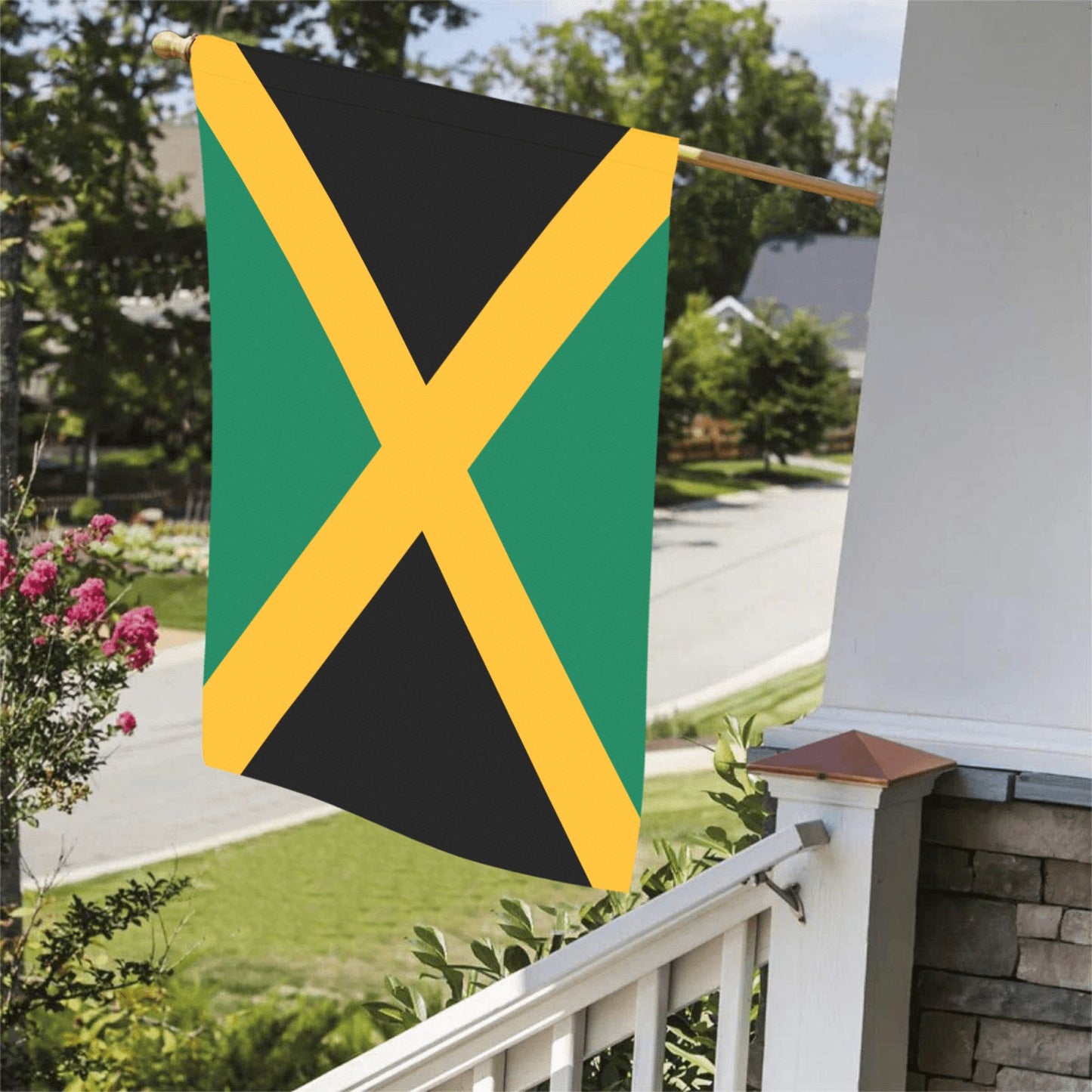 Jamaican flag displayed on porch, by Luv My Flag.