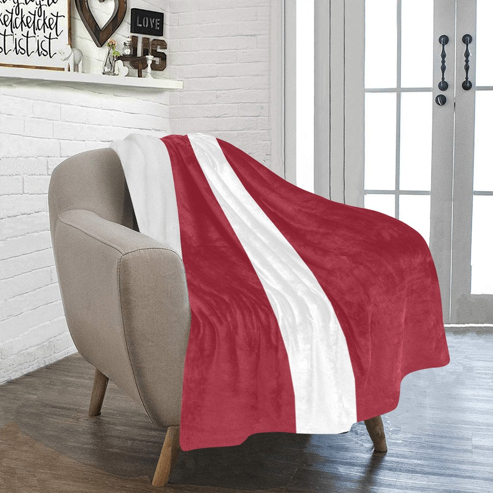 Cozy red blanket with white stripe on chair, Luv My Flag.