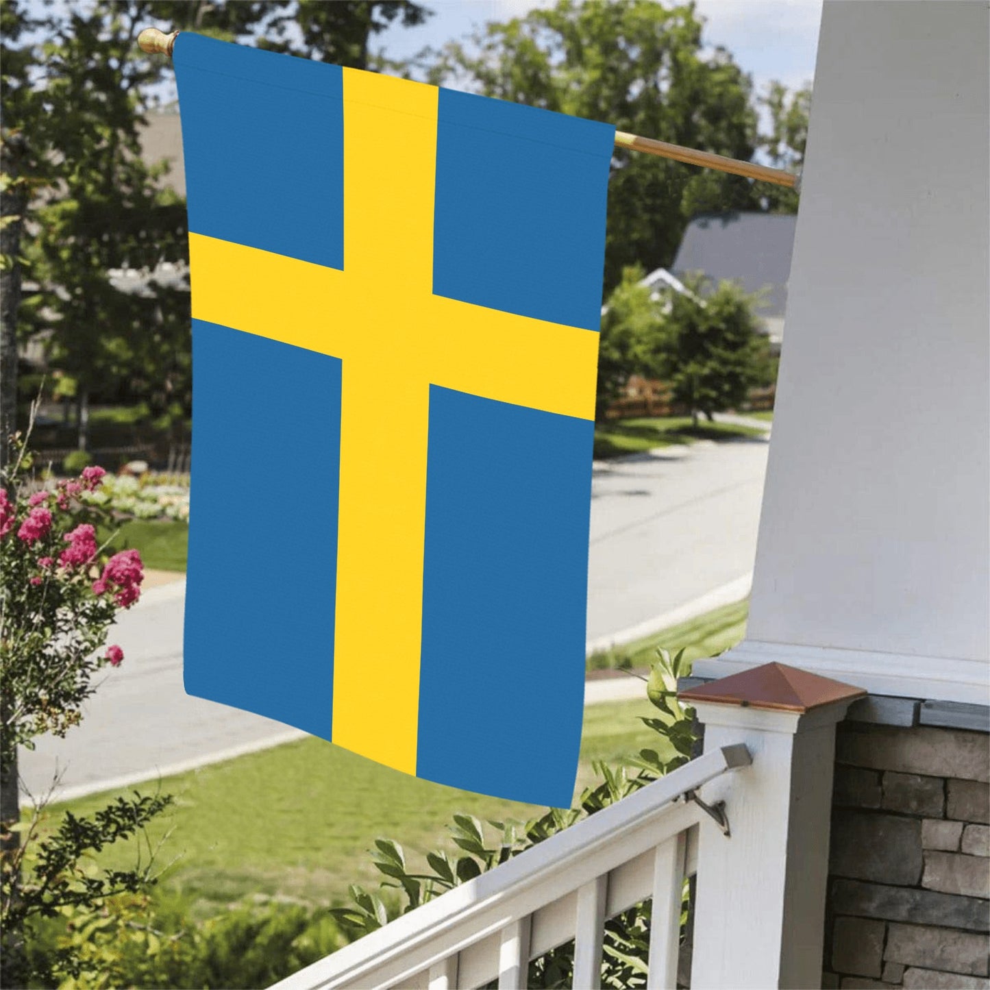 Swedish flag on porch, suburban neighborhood setting, Luv My Flag.