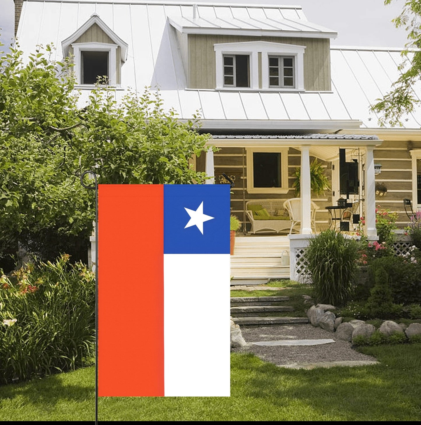 Front yard with Luv My Flag, cottage-style house background.