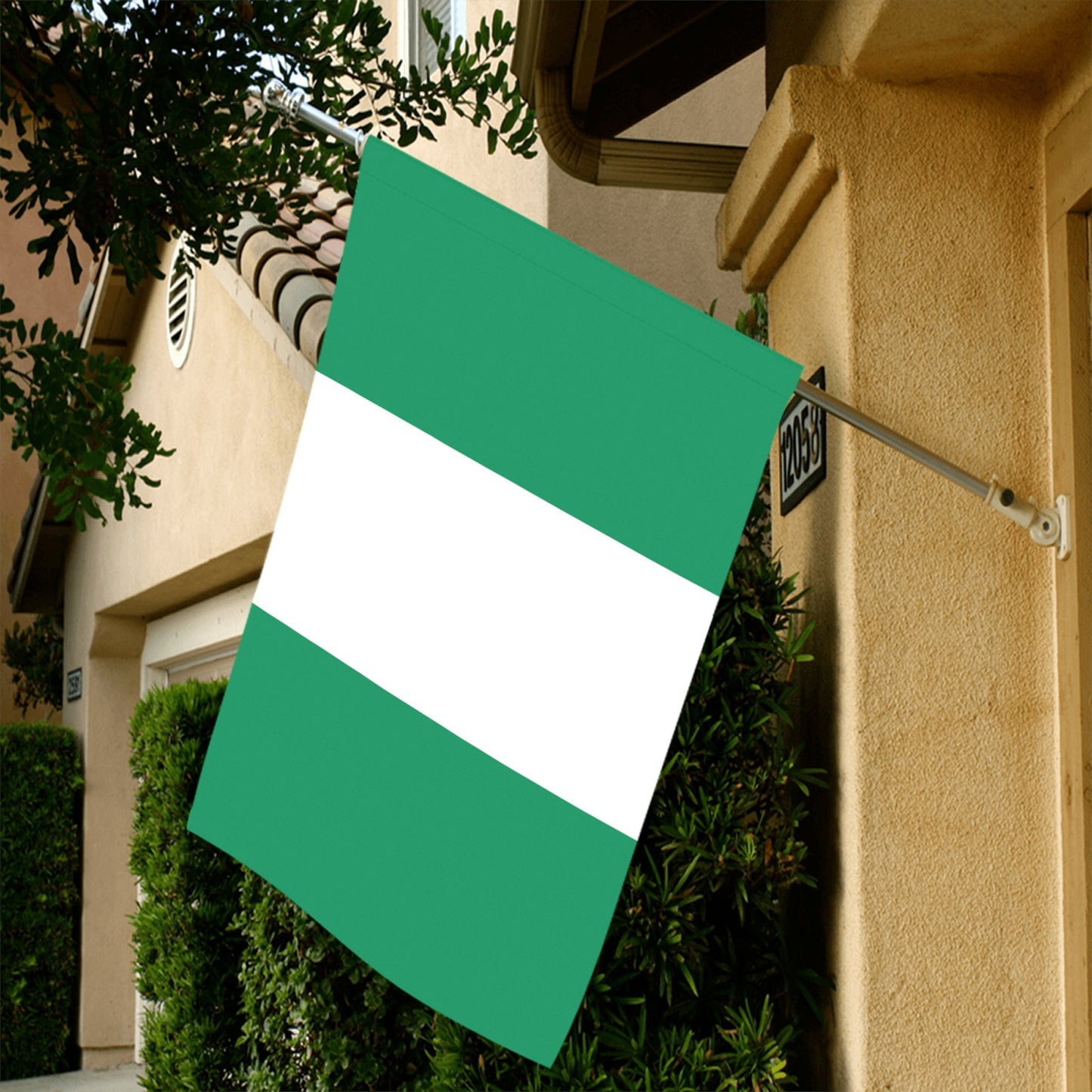 House displaying Nigeria flag from Luv My Flag brand.