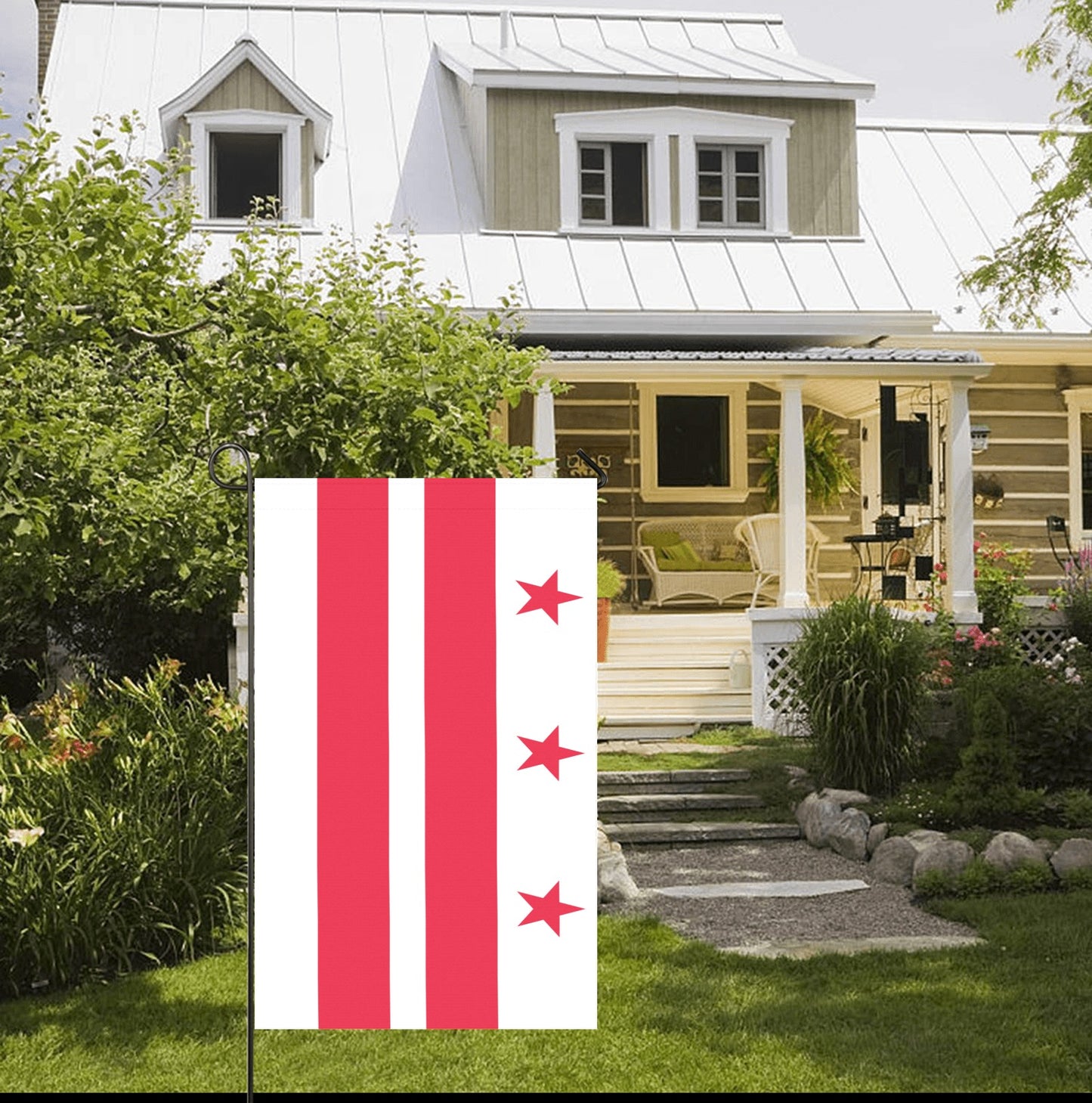 House with porch, garden, displaying Luv My Flag outdoors.