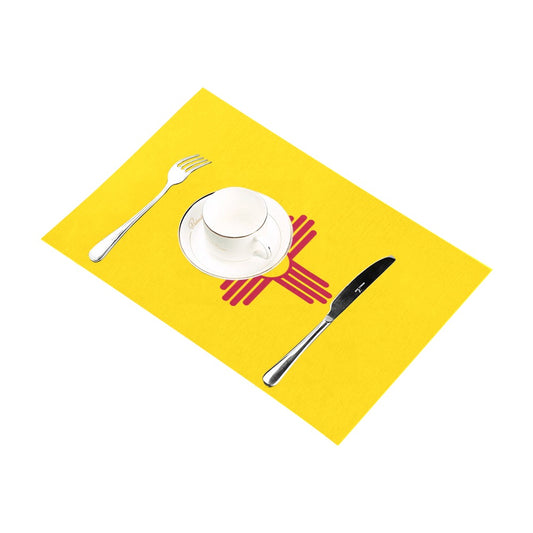 Yellow Luv My Flag placemat with silverware and teacup.