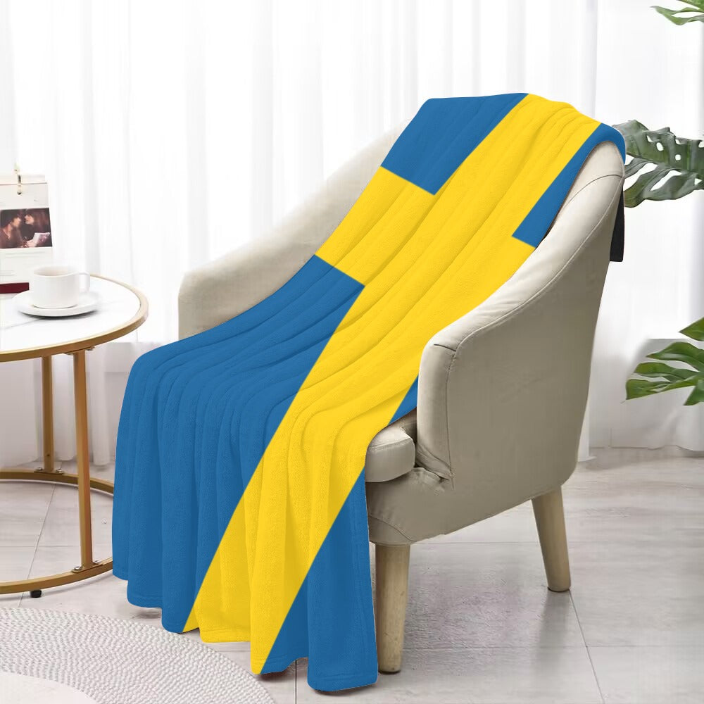 Luxurious Luv My Flag blue-yellow throw blanket on chair.