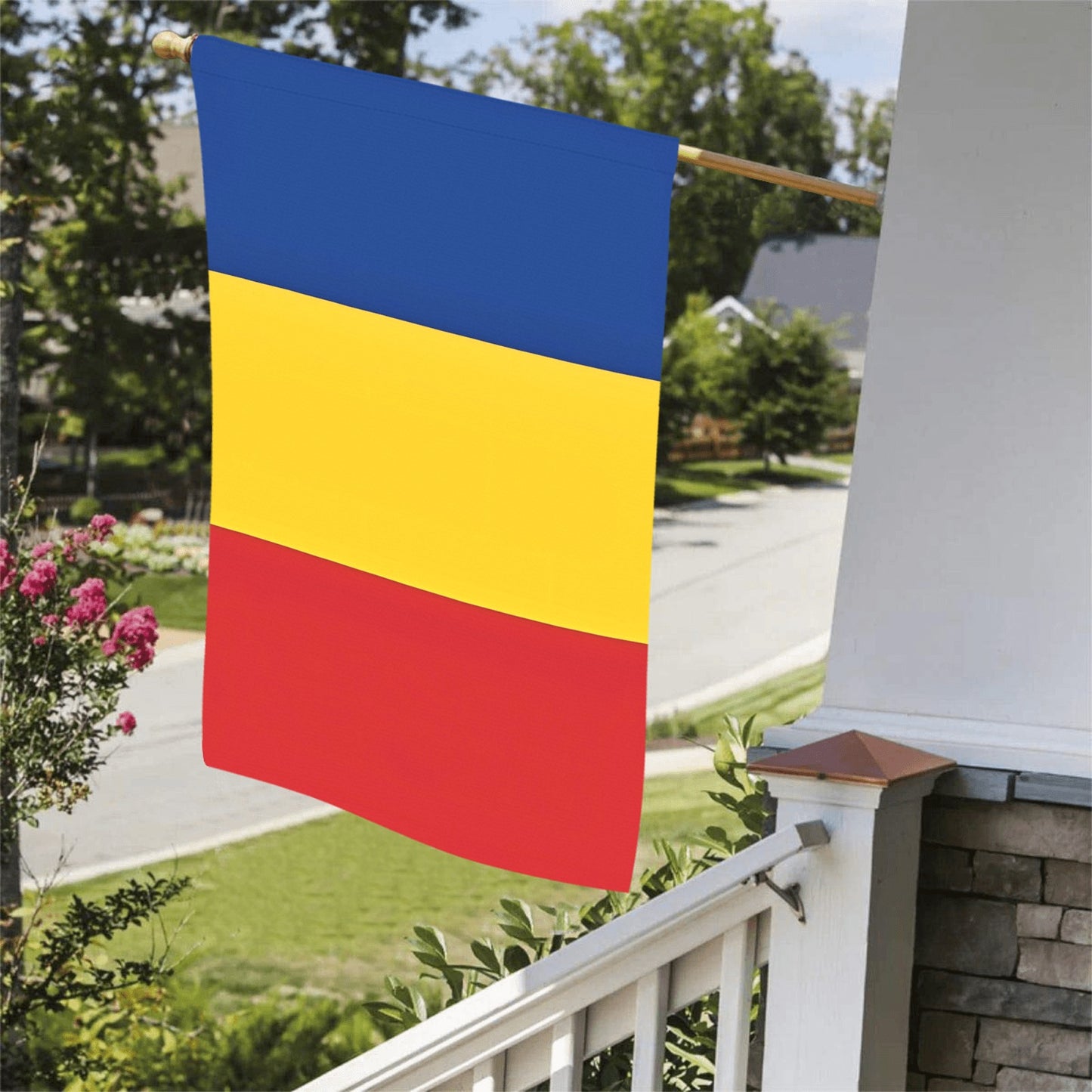 Luv My Flag tricolor flag hanging outside suburban house.