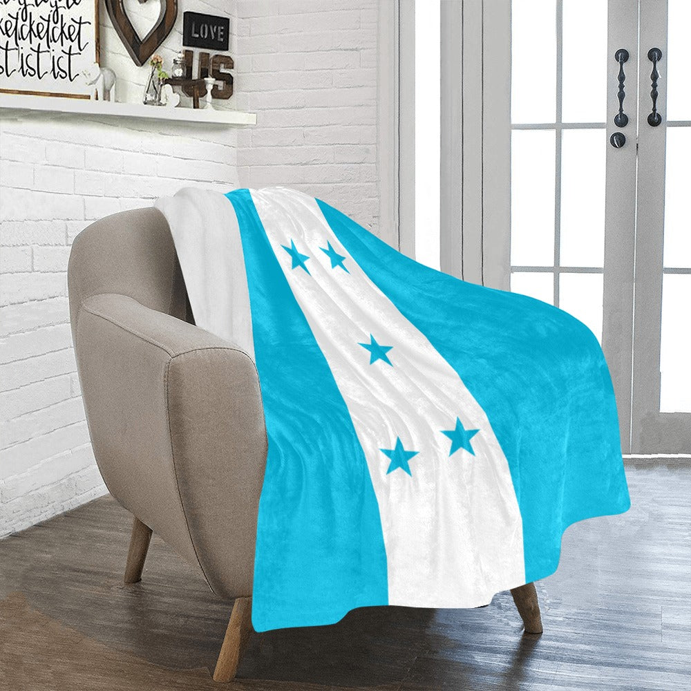 Luv My Flag blanket showing Honduran flag casually draped.