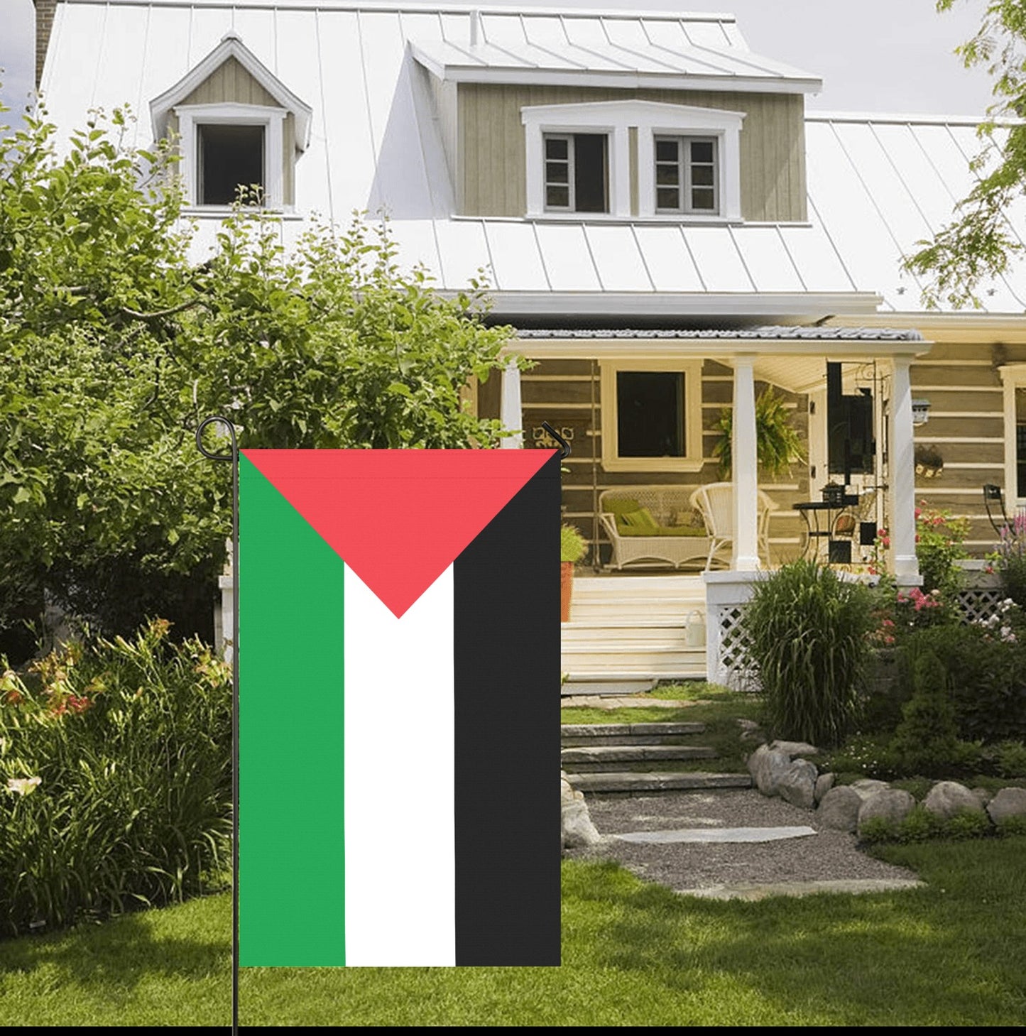 House with Luv My Flag garden flag, Palestine colors displayed.