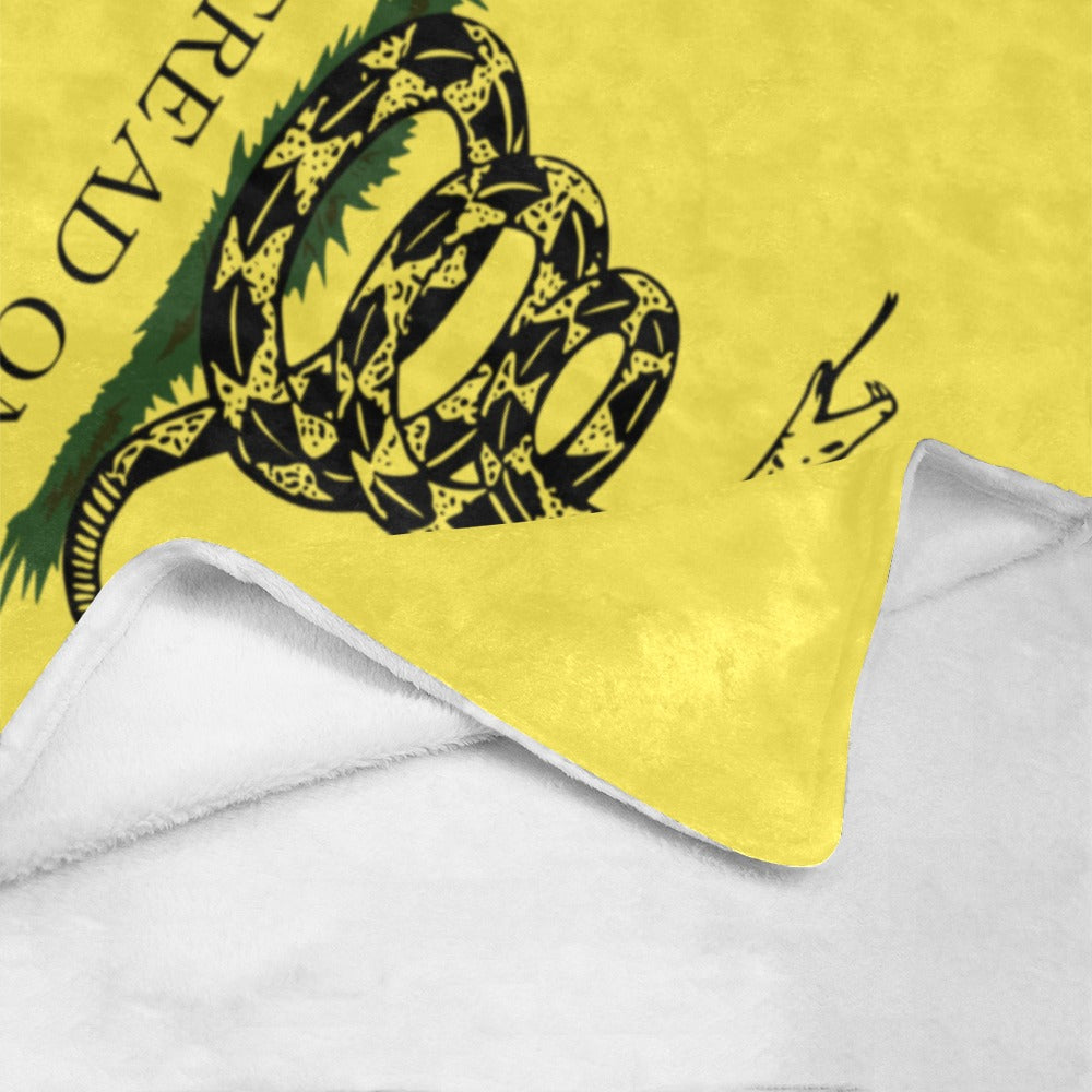 Yellow blanket with snake design, by Luv My Flag.
