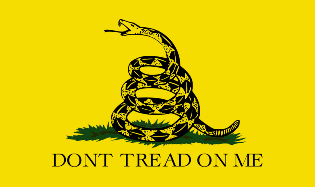 Gadsden Flag with a coiled rattlesnake on a yellow background and the words Don’t Tread on Me, symbolizing American liberty, personal freedom, and resistance to tyranny