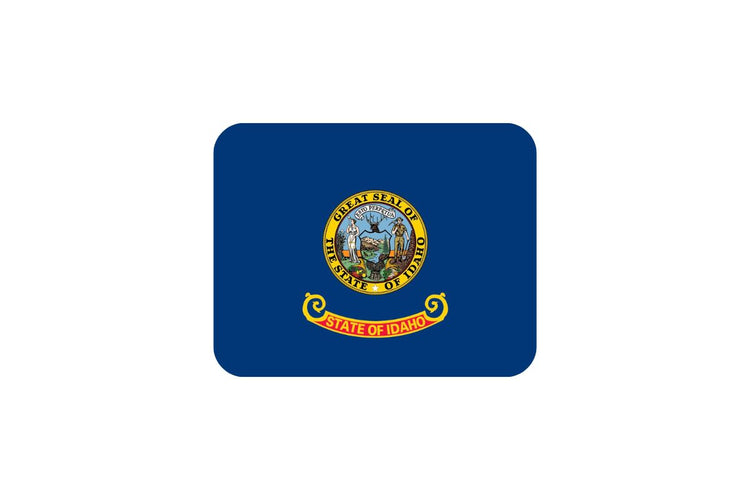 Idaho state flag with a dark blue field featuring the state seal in the center above a red and gold banner that reads “State of Idaho.”