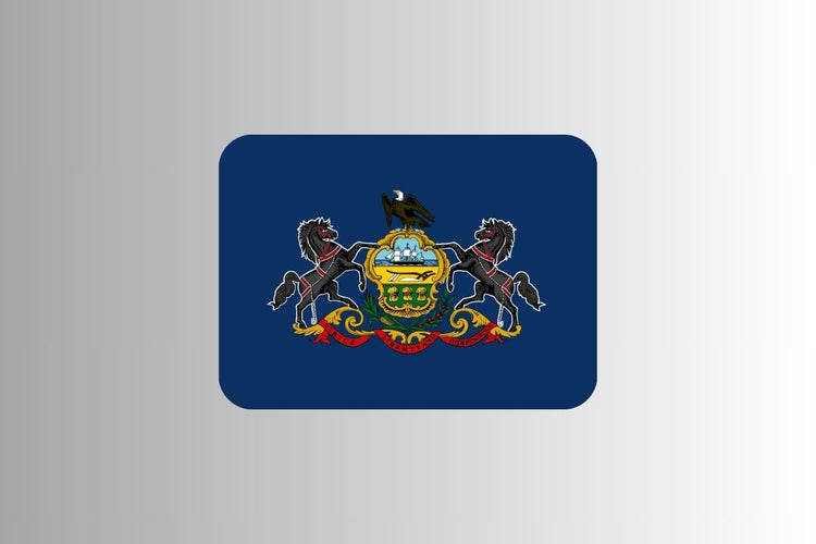 Pennsylvania state flag with a blue field featuring the state coat of arms: a shield supported by two black horses, an eagle above, and a banner below reading “Virtue, Liberty and Independence.”