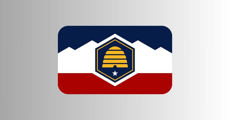 Modern Utah state flag with red, white, and blue background, gold beehive, and star, centered on a white background with rounded corners