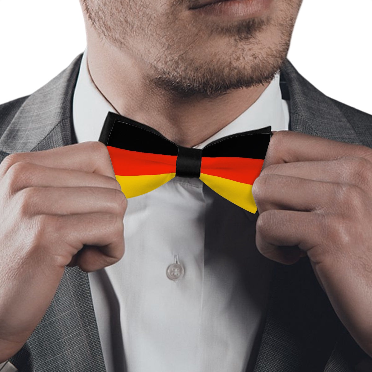 [Brand] bow tie with German flag pattern worn confidently.