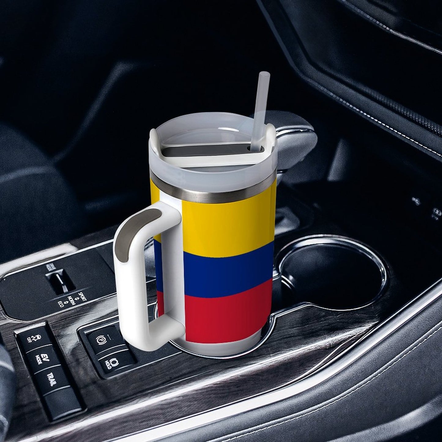 [Brand] mug with Colombian flag in a car holder.