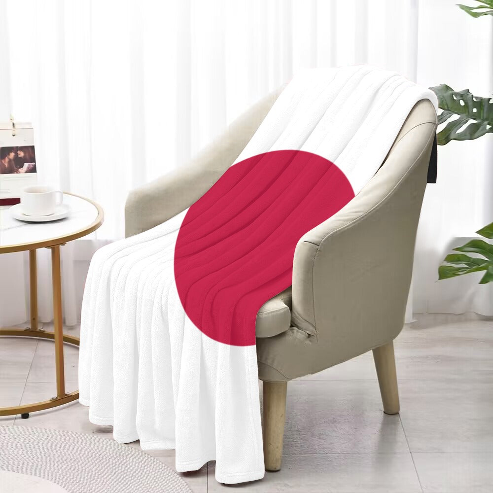 [Luv My Flag] Japanese flag blanket on beige chair.