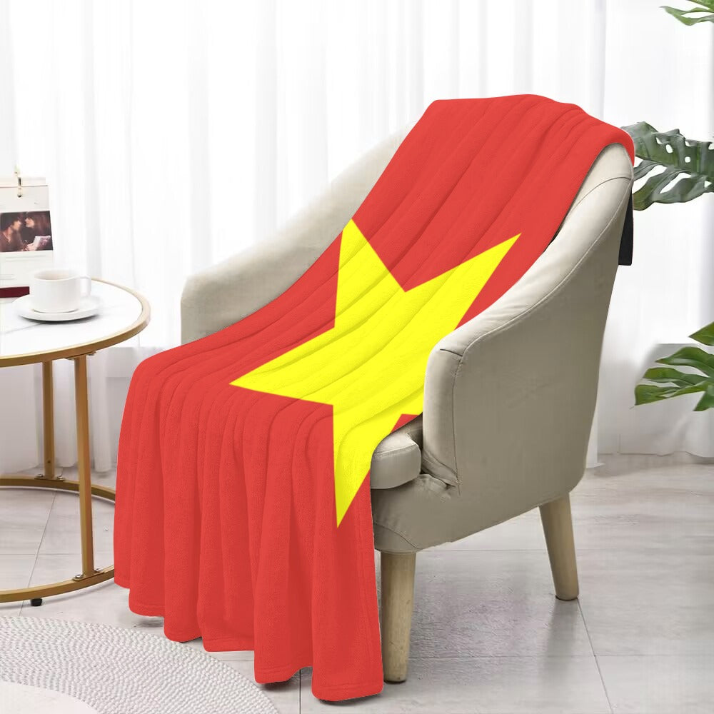 [Luv My Flag] red and yellow blanket draped over chair.