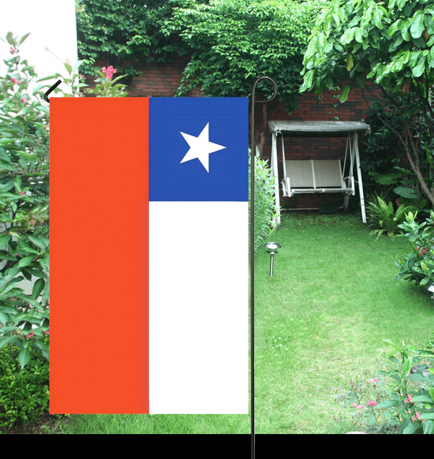 [Luv My Flag] garden flag in lush green backyard.