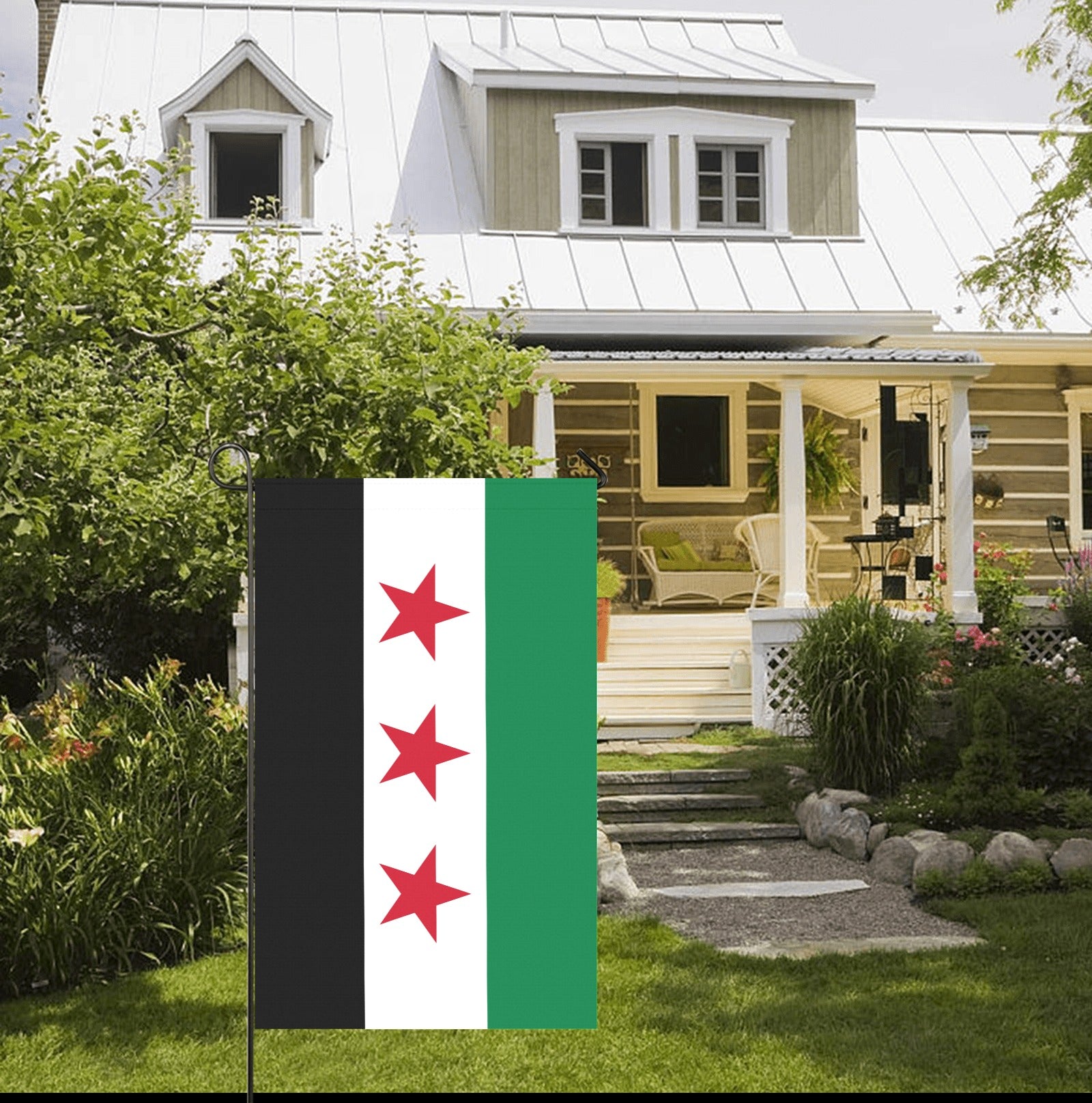 Front yard with Luv My Flag, porch, and garden.
