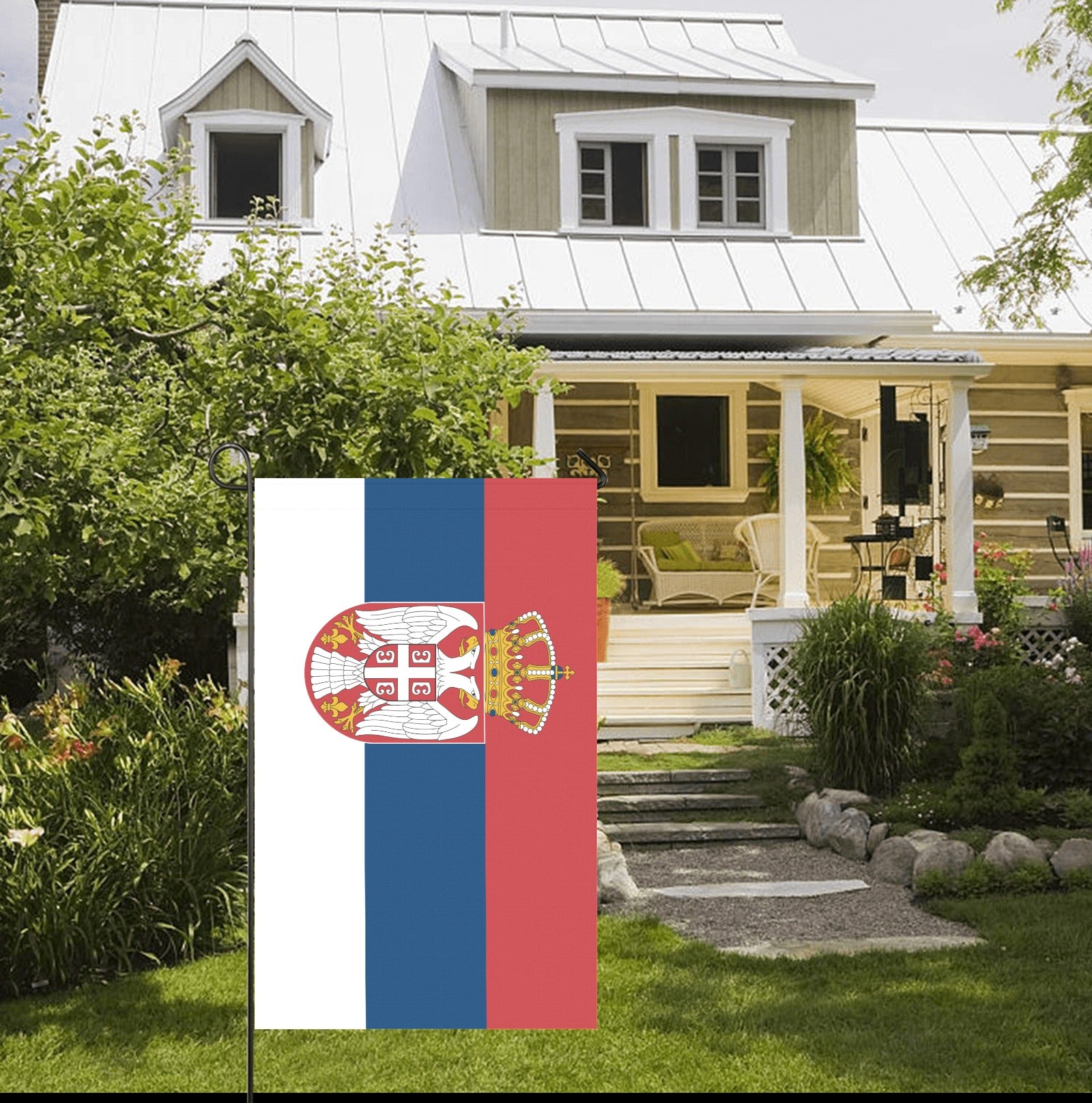 House with [Luv My Flag] Serbian flag garden display.