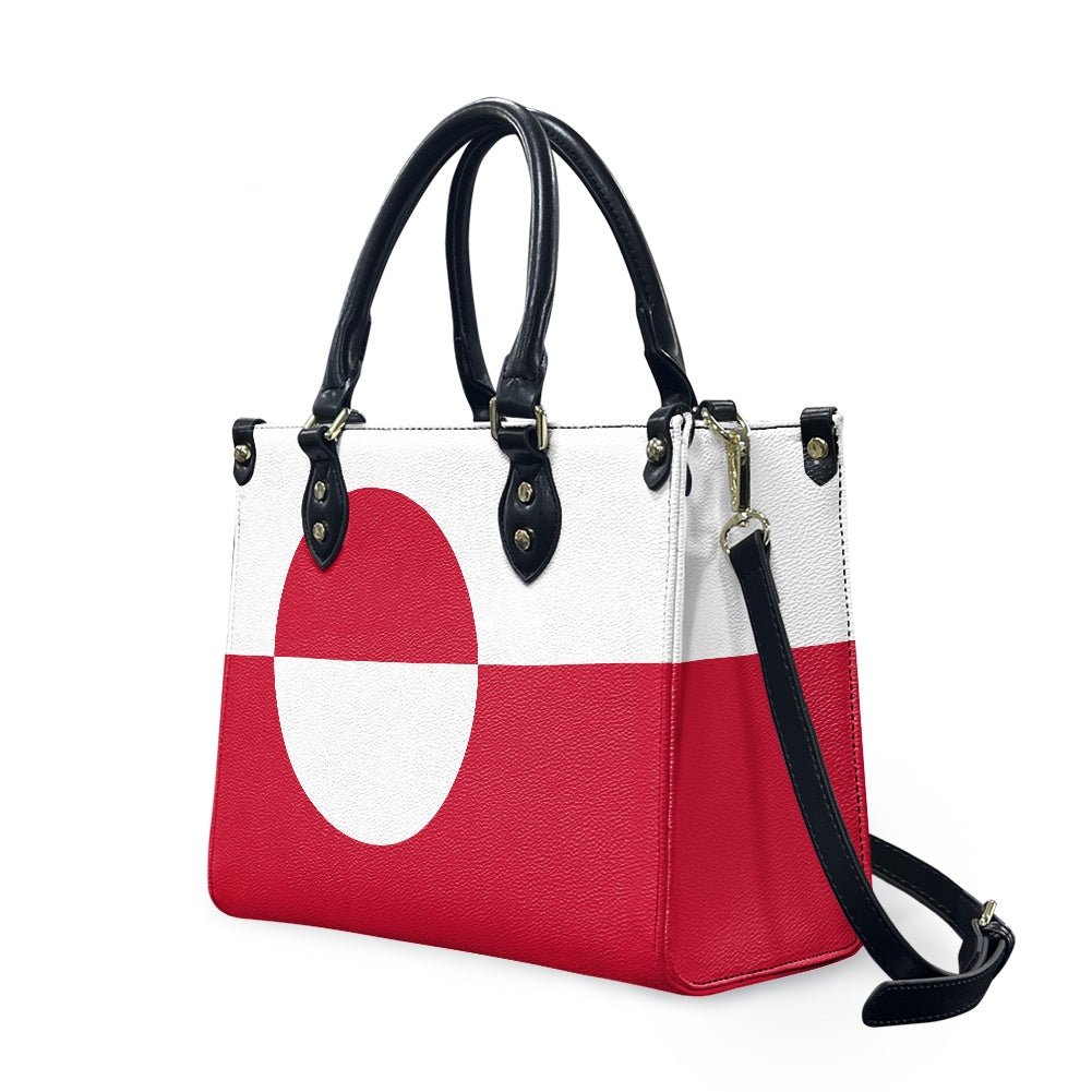 [Brand] handbag featuring Greenland flag design, black leather handles.