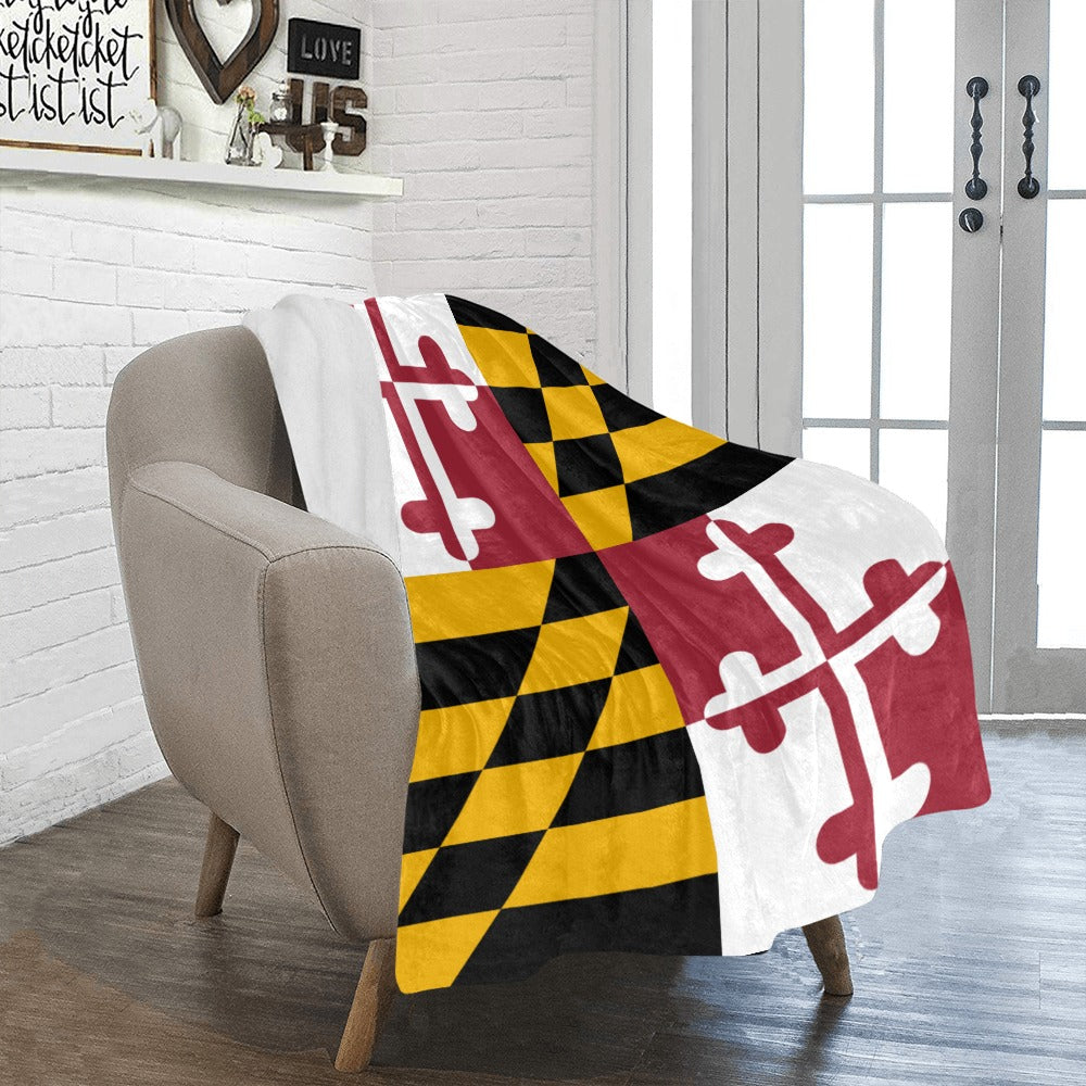Luv My Flag blanket featuring Maryland flag design on chair.